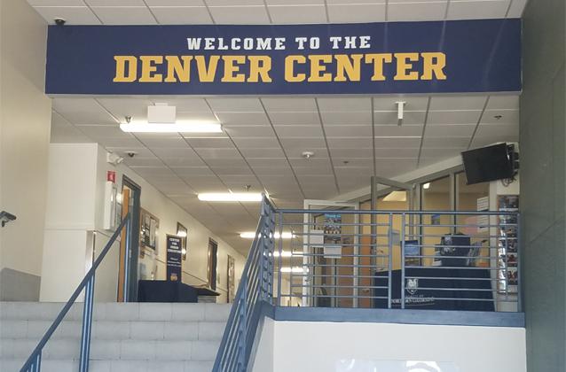 UNC Denver Center lobby entrance with welcome banner.
