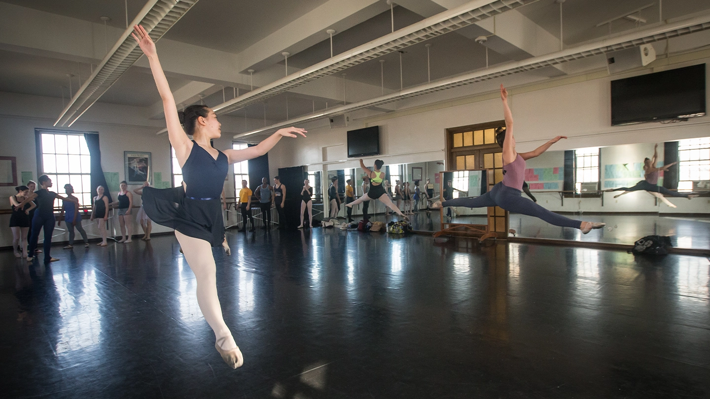 Dance education master's class session featuring ballet.