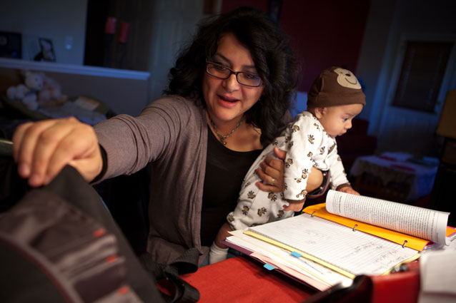 UNC Student studying with her child