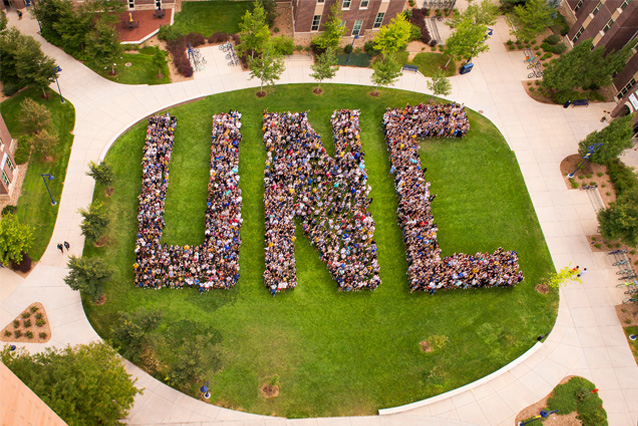 Overhead photo of students on campus arranged to form "UNC."