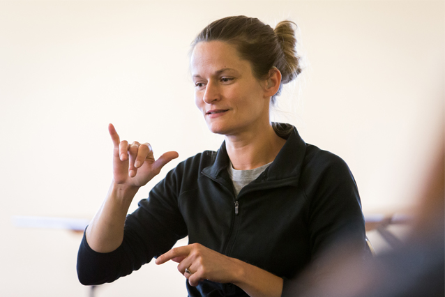 Photo of woman signing