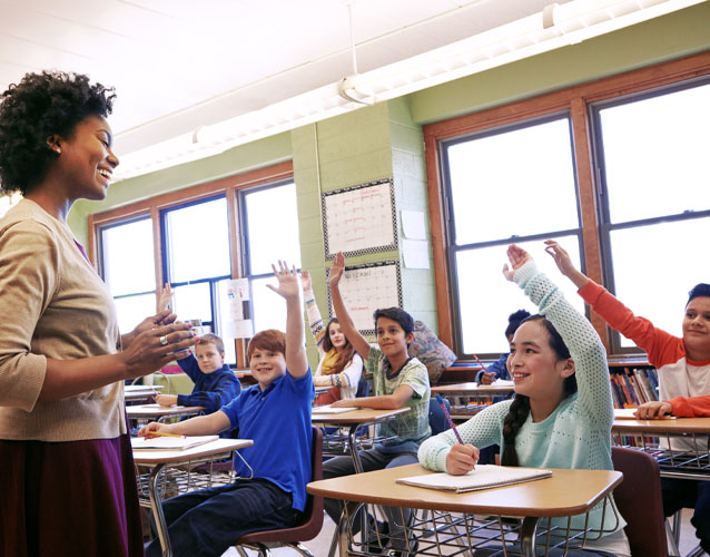 Gifted education teacher adressing excited students