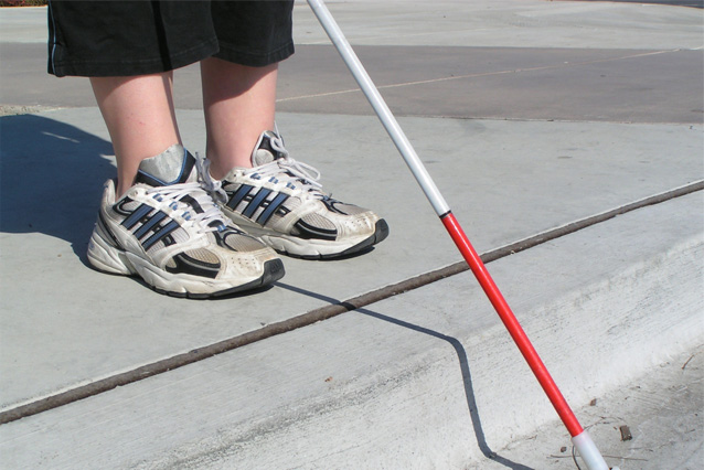 Photo of boy with walking stick